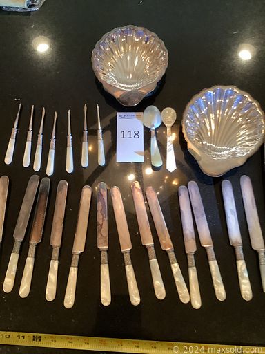 MaxSold Auction: This online auction includes sterling silver pitcher, plates, flatware, salt and pepper shakers, candelabras, carving utensils, serving pieces and more!