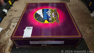 MaxSold Auction: This online auction features display houses & accessories, Lionel train set, cars & accessories, cookie jars, cameras, Dept 56 Snow Village buildings & accessories, vinyl records, Ashton Drake doll, train collectibles, lead figures, die-cast vehicles, Hallmark Christmas ornaments, stamps,  plastic shelving, and much more!