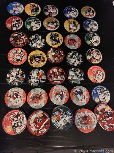 MaxSold Auction: This online auction features sports trading cards such as MLB, NHL circle, Premier League,  Mini Jersey, draft, rookie, NBA, Fleer Ultra and much more!