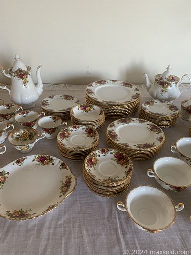 MaxSold Auction: This online auction features abstract paintings, small kitchen appliances, art glass, decorative plates, decanters, art pottery, teapot collection, desk, wood & glass table, S & P shakers, men’s neckties, and much, much, more!!!n