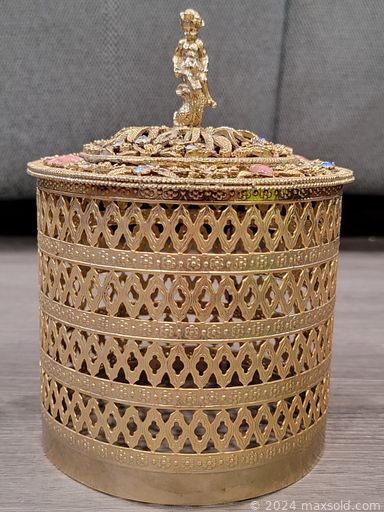 MaxSold Auction: This online auction features Moorcroft dish, bisque vase, sterling silver jewelry, decoy, brass miniatures, art glass items, old vanity pieces, stamp collection, Okimono figurines, native sand painting, pottery, wood train set, other wooden items, Lego, Pez dispenser, Looney tunes collectible cards, comics, old military & police buttons and much more.