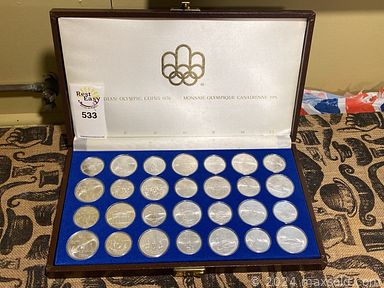 MaxSold Auction: This online auction includes furniture such as an antique buffet, shelving units, MCM sideboard, bedframes, wood desk, upholstered chairs, antique couch and others, Brinkmann grill, wood, tools, hardware, stained glass martini set, cameras, magazines, books, gemstones, home decor, antique Singer sewing machine, frames and prints, vintage sports equipment, dressforms, shoes, accessories and more!