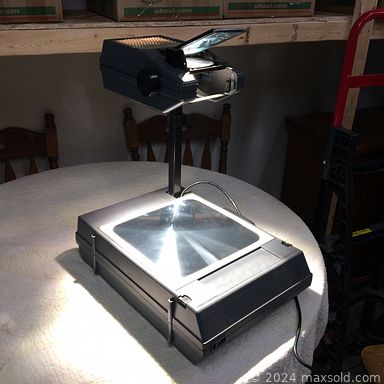 MaxSold Auction: This online auction includes a hitch, Panasonic vacuum, bank sign, electronics, Samsung TV, office items, CDs, books, jewelry, clothing, Simoniz waxer, postcards, clothing, maps, overhead projector, board games, Dry Sack, autofolder and more!