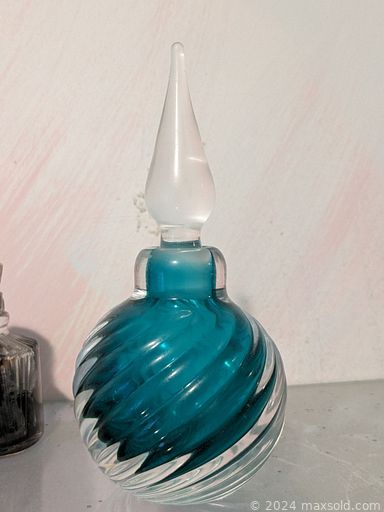 MaxSold Auction: This online auction features art glass, decorative eggs, Heritage Village collection, perfume bottles, Navajo sand art, Tribal art, metal art, stamps, games, stone decor, art pottery, Chinese relief panels, doll house furniture, Scherenschnitte art, marionettes, costume jewelry, sterling jewelry, vintage mantle clock, Dept 56 Christmas villages, S & P shakers, and much, much, more!!