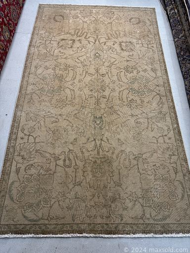 MaxSold Auction: This online auction includes Persian rugs from Zanjan, Gharajeh, Tabriz, Shiraz, Esfahan and more!n