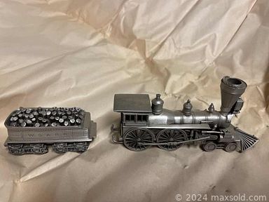 MaxSold Auction: This online auction features various items such as decor, departments stand, Christmas figurines, snowman collection, Christmas decor, wall art, basket, nativity set, vintage lanterns, candles, cups, mugs, ceramics, misc decor, goblet glasses, table, books, blanket, doll chairs, artwork, office supplies, bookcase, lamp, military pins, cd recorder, framed art, cabinet, sailboat, speakers, records, train set and much more.