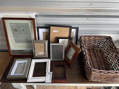 MaxSold Auction: This online auction includes a coffee table, framed print, accessories, clothing, kitchenware, plant stands, picture frames, decorative wall cabinet, HP printer, lamps, folding crates, Taotronics massage tool, Moen faucet and more!