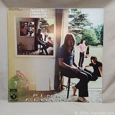 MaxSold Auction: This online auction includes vinyl records, concert programs, music DVDs, tapes, CDs, books, and more!