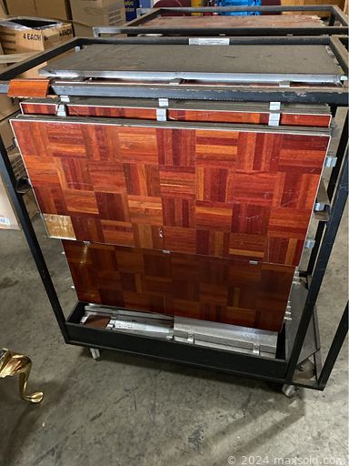 MaxSold Auction: This online auction includes a coffee table, end tables, technical workstations, trash bins, wase baskets, supply cabinet, water bottles, dollies, card scanner, wall art, projector and more!