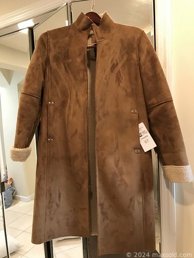 MaxSold Auction: The online auction feathers furniture artwork, Christmas ornaments, china sets, sculptures, planters, sweatshirts and pajamas, twin beds, mirrors, metalwork, fireplace screen and much more!