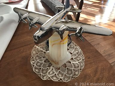 MaxSold Auction: This online charity auction includes antique sterling silver, antique lamps, Canadian airplane lamp, Washburn acoustic guitar, fine china, vintage chandelier, original paintings, vintage Christmas decor, railroad lanternAs, costume jewelry and much more!