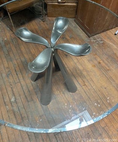 MaxSold Auction: This online auction features MCM Teak cabinet, Brutalist style metal figures, original abstract painting, sports trading cards, salt & pepper shakers, vintage golf clubs, vintage lead glass windows, antique tools, area rugs, decanters, vintage books, vintage First Nations moccasins, glass shades, antique fireplace andirons and much more!