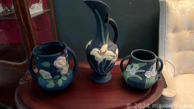 MaxSold Auction: This online auction features furniture such as wood filing cabinet, dresser, Mahogany Vitrine, parkour chair, upholstered couch, wing back chairs. Trestle table and server table. Also includes full size bed, blanker holder, cherry chair, shelving unit bookcase, curio cabinet, snack tables, ladder back chairs and glass table. Includes Black & Decker saw horses, pottery vases, DVD collection, book collection, glass vase trumpet and much more!