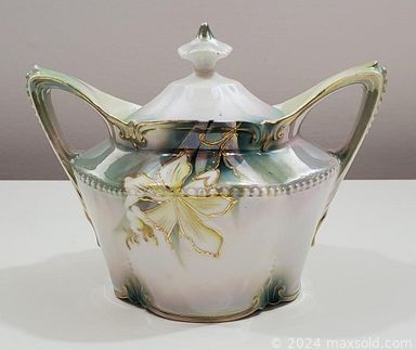 MaxSold Auction: This online auction features vintage scarves, art glass, depression glass, vintage bone china floral, Empress by Adams china, Toby jugs, perfume bottle, cranberry glass, teacup/saucer sets, handbags, hats, vintage costume jewelry, new beauty products, Holly Hobbie collectors plates and much more!