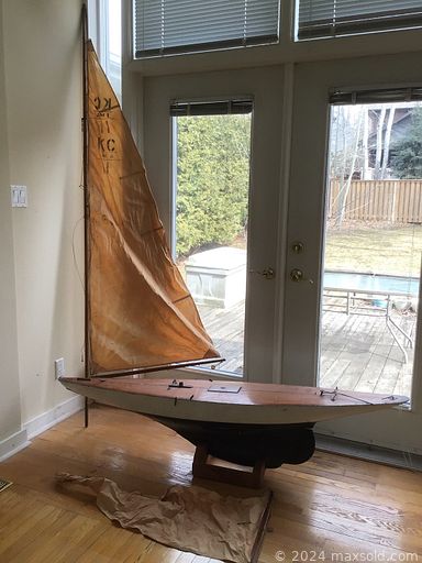 MaxSold Auction: This online auction features a curio cabinet, sideboard, wood cabinet, wagon wheel table, side tables, secretary, sideboard, Knetchel cabinet, sewing machine in cabinet, typewriter, cathedral mirror, vintage radio, model sailboat, lamp posts and much more!