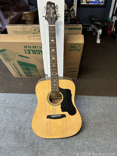 MaxSold Auction: This online auction features glass top tables, oak barrel table, sideboard, treadmill, shelving units, armoire, sports trading cards, storage bench, guitar, decanters, and more!