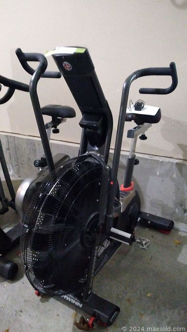 MaxSold Auction: This online auction features exercise equipment, chandeliers, desk chairs, area rug, corner curio cabinet, printer, shelving, club chair, yard tools, bay boat, Doug Forsythe prints, and much more!!