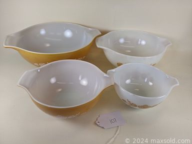 MaxSold Auction: This online auction features end tables, steel wire footstool, curio display shelves, pottery & walnut table lamp, hall china pink teapot, corning ware, Lenox porcelain bowl, portable typewriter, mechanical juicer, vintage Columbia bicycle and much more!