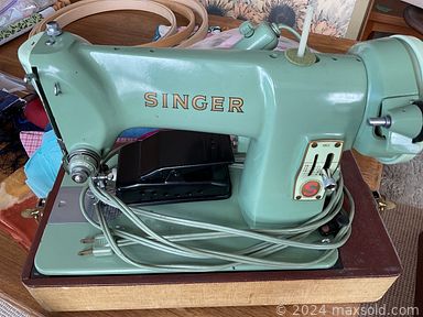 MaxSold Auction: This online auction features wood shelving unit, entertainment/display cabinet, teacup/saucer sets, sewing machine, leather chair & ottoman, and much, much, more!!