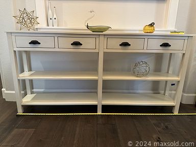 MaxSold Auction: This online auction includes a sideboard, hall bench, office chair, vintage foo dogs, sculptures, comic books, wall art, Paris decor, Z Gallerie mirror, coins, decanters, china and more!