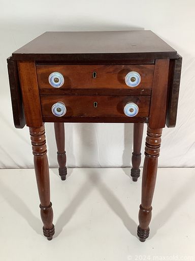 MaxSold Auction: This online auction features sterling silver, woodblock prints, framed art posters, furniture such as caned back armchair, inlaid wood stools, side tables, wooden hutch, and rattan chairs, and much more!