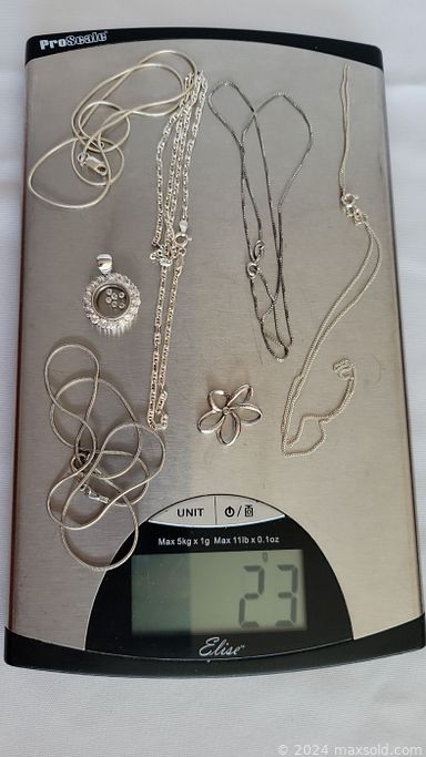 MaxSold Auction: This online auction features antique Singer sewing machine, framed wall art, fine china, rock tumbler, vinyl records, vintage Christmas decor, silver jewelry, MCM teak table,  Waterford crystal ware, Royal Doulton, kitchenware and much more!