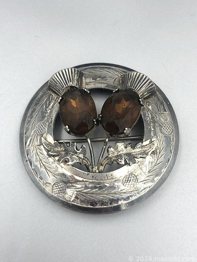 MaxSold Auction: This online auction features gemstone jewelry, sterling silver jewelry, costume jewelry, cloisonné bracelets, coins, watches, silver brush & mirror, jade bangles, jade carvings and much more!