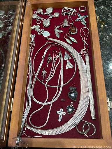 MaxSold Auction: This online auction includes furniture such as chairs, upholstered couch, Midcentury rocker, Bombay Co. desk, side tables, dining room chairs, curio cabinet, carved Asian table, inlaid tea service cart, wicker shelving unit, Midcentury sewing cabinet and others, Sony Bravia 65” TV and other electronics, silverware, kitchenware, small kitchen appliances, clothing, jewelry, accessories, vintage records, lamps, seasonal decor, Tiffany style lamp shades, Lladro figures, vintage nutcrackers, Noritake and other china, wall art, books, wicker baskets, linens, rugs, Rubbermaid storage unit, garden decor, ladders, suitcases, outdoor gear and many many more!