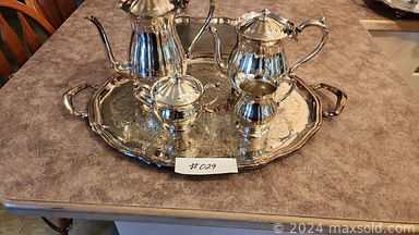 MaxSold Auction: This online auction features silver-plated lot, glassware, crystal ware, decanters, pots and pans, decorative plates, serving trays, pressure cooker, baking lot, Pyrex bowls, Noritake cream & sugar, bunny dishes, fine china cups & saucers, china cabinet, mason jars, projector, thermos, mannequins, vintage records, globe, BBQ, casserole dishes, cabinet, bookcase, pennies, books and much much more.