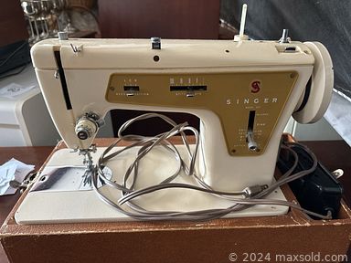 MaxSold Auction: This online auction features teak wall unit, desk, copper pieces, rattan furniture jewellery, vinyl records, small kitchen appliances, yard tools, patio furniture, area rugs, concrete planters, mobility aids, antique wine press, TV, vintage games & toys, sewing machine, sewing notions, hand tools, art glass, office supplies, coins, and much, much, more!!