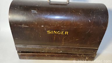 MaxSold Auction: This online auction features antique Singer sewing machine, framed wall art, fine china, rock tumbler, vinyl records, vintage Christmas decor, silver jewelry, MCM teak table,  Waterford crystal ware, Royal Doulton, kitchenware and much more!