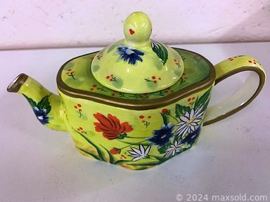 MaxSold Auction: This online auction features decorative plates, cameras, vintage hurricane lamp, vintage lockets, coins, banknotes, novelty teapots, area rug, James Bessey watercolors, Harley Davidson apparel, sterling jewelry, oil lamps, watches, guitar, violin, vintage brooches, pocket watches and much more!