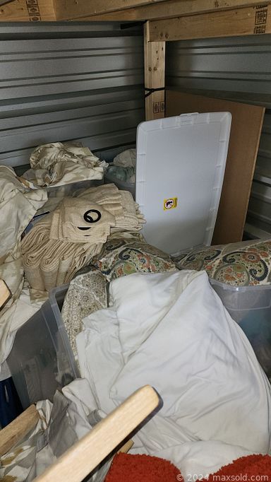 MaxSold Auction: This online auction features a stagers storage unit containing wall art, upholstered chairs, decorative pillows, table & chairs, tableware, area & throw rugs, curtains & rods, glassware, upholstered headboard, storage racks, and much, much, more!!