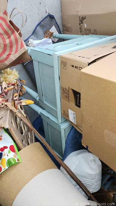 MaxSold Auction: This online auction features a stagers storage unit containing wall art, upholstered chairs, decorative pillows, table & chairs, tableware, area & throw rugs, curtains & rods, glassware, upholstered headboard, storage racks, and much, much, more!!