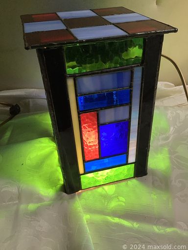 MaxSold Auction: This online auction features coins, video game console & games, stained glass lamps, art glass, sports trading cards, beer taps, soapstone carving, stained glass panel & suncatchers, art pottery,  collector plates, figural lamp, small kitchen appliances, antique wool winder, collector spoons, cookie jar, S & P shakers, outerwear, Avon collectibles, and much, much, more!!!