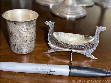 MaxSold Auction: This online auction includes signed and matted photography, Epson photography printer, Delftware, sterling silver,  framed art, furniture such as Crate & Barrel dining chairs, curio cabinet, pedestal table, wood hutch, leather chair and Maxhome sofa, small kitchen appliances, stemware, area rugs, silverplate, power tools, lamps, vintage toys  and much more!