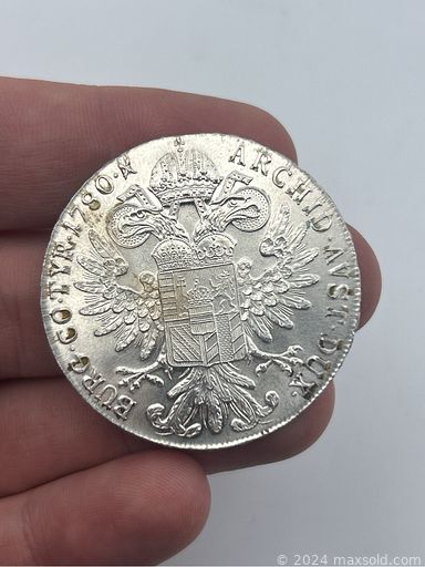 MaxSold Auction: This online auction includes jewelry, accessories, lapel pins, watches, lamp crystals, coins, match vesta, candelabra, hunting dog door stop, brassware, Foo dogs, pottery and much more!