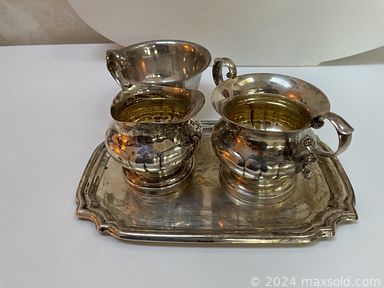 MaxSold Auction: This online auction features signed Queen headboard, bedding, Oil on canvas, abstract original art, prints, nightstand, chest, ottoman, bakeware, framed art, tables, lamps, decor,   large horse sculpture, fireplace tools, electronics, barometer, art glass items, barware, cookware, Pfaltzgraff dinner set, wine cooler, bar refrigerator, silver plate serving items, 	sterling silver creamer & sugar, kitchen appliances, kitchen items, armchair, garden tools, cleaning supplies, cutlery, clarinet, glassware, hedge trimmer, antique cash register, sentry safe and much much more.