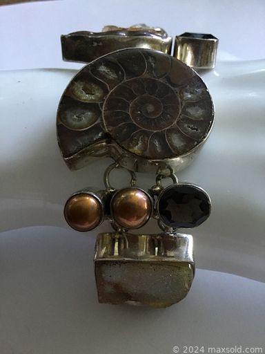 MaxSold Auction: This online auction features vintage silver jewelry, gemstone jewelry, charm bracelet, pearl bracelet, gold solitaire ring, jadeite disc pendant and much more!