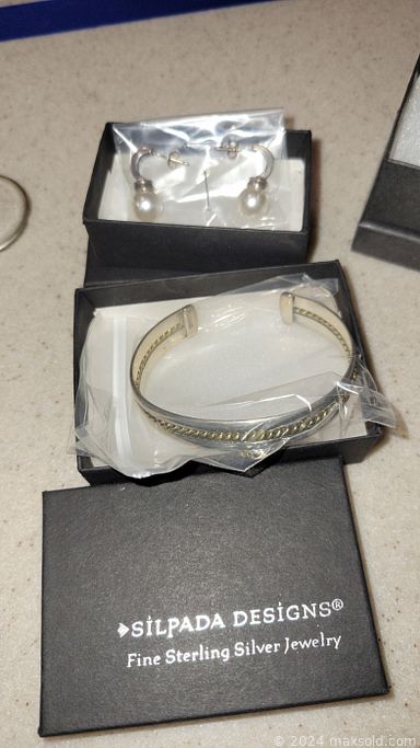 MaxSold Auction: This online auction features Longaberger baskets, crystalware, sterling silver, furniture such as Rowe sofa and armchairs, wood coffee table, and oak storage cabinet desk, small kitchen appliances, renovation materials, gardening supplies, yard tools, power tools, robot vacuum, vintage books, model train sets, framed wall art, Mitsubishi stereo, lamps and much more!