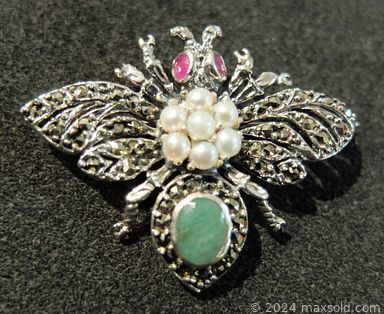 MaxSold Auction: This online auction features pearl necklace, diamond ring, sterling silver jewelry, Chinese jade, tokens, foreign currency, coin sets, Pokemon cards, military medals & cap badges, loose gemstones such as topaz, amethyst, lapis lazuli, emeralds, and much, much, more!!!