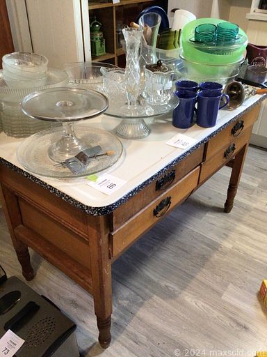 MaxSold Auction: This online auction includes 50” Samsung TV, aluminum boat, furniture such as dining chairs, side tables, La-Z-Boy power recliner, cabinets, office desk, and wood dressers, glassware, nautical decor, model ships, lamps, small kitchen appliances, costume jewelry, framed art, power tools and much more!