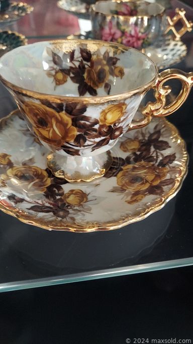 MaxSold Auction: This online auction includes framed art, Samsung TV, furniture such as dining room chairs, end tables, curved sofa, display cabinets and dressers, fine china, home decor, dishware, and more!