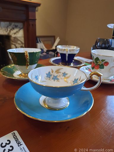 MaxSold Auction: This online auction features an Ethan Allen dresser, cabinet, side tables, patio chairs, flatware, Wedgewood teacups, coffee set, Hockey card, humidifier, fireplace tools, globe, BBQ grill and much more!