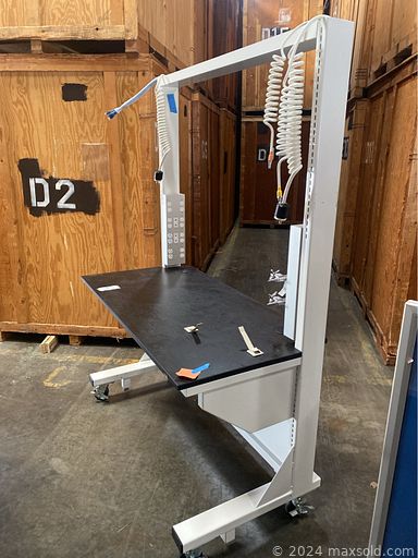 MaxSold Auction: This online auction includes a coffee table, end tables, technical workstations, trash bins, wase baskets, supply cabinet, water bottles, dollies, card scanner, wall art, projector and more!