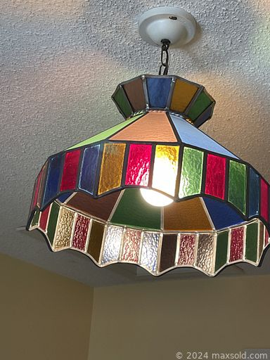 MaxSold Auction: This online auction includes MCM decor, Lladro figures, furniture such as teak dining table, teak sideboard, curio cabinets, vintage pine dresser and bunk beds, stamp collections, stained glass light fixtures, framed artwork, and much more!