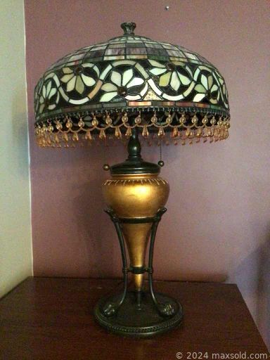 MaxSold Auction: This online auction features artwork, furniture, small kitchen appliance, collectibles, lamps, decor, chinaware, dinnerware, Royal Doulton figurines, Tiffany lamp, Moffat Vintage Stove, comics and much more!