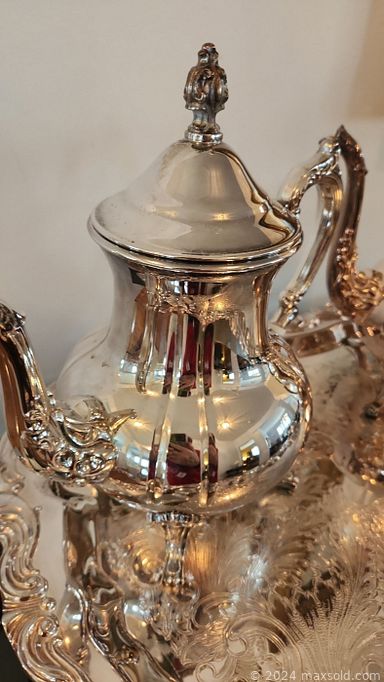 MaxSold Auction: This online auction features silver plate sets, framed art, costume jewelry, furniture such as carved wood settee, side tables, armchairs, antique washstand and sofa, lamps, bakeware, home decor, glassware, Sony speakers and much more!