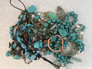 MaxSold Auction: This online auction features jewelry, watches, jewelry boxes, sterling jewelry, flower pots, salt & pepper shakers, sports memorabilia, vintage postcards, slot machine, games and much more!