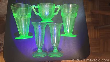 MaxSold Auction: This online auction features antique rocking horses, Thai spirit house, decanter, antique toys, Harmony Kingdom figurines, wood carvings, antique metal miniatures, antique clay marbles, vintage eyeglasses, stamps, antique books, art pottery, Uranium glass, costume jewelry, tin lanterns, Tiffany-style lamp, Fenton glas, tin toy, soapstonde carving, stoneware jugs, Gnome collection, teacup/saucer sets, antique mandolin, and much, much, more!!!